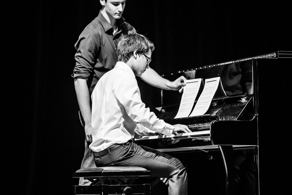 Playing the piano on stage