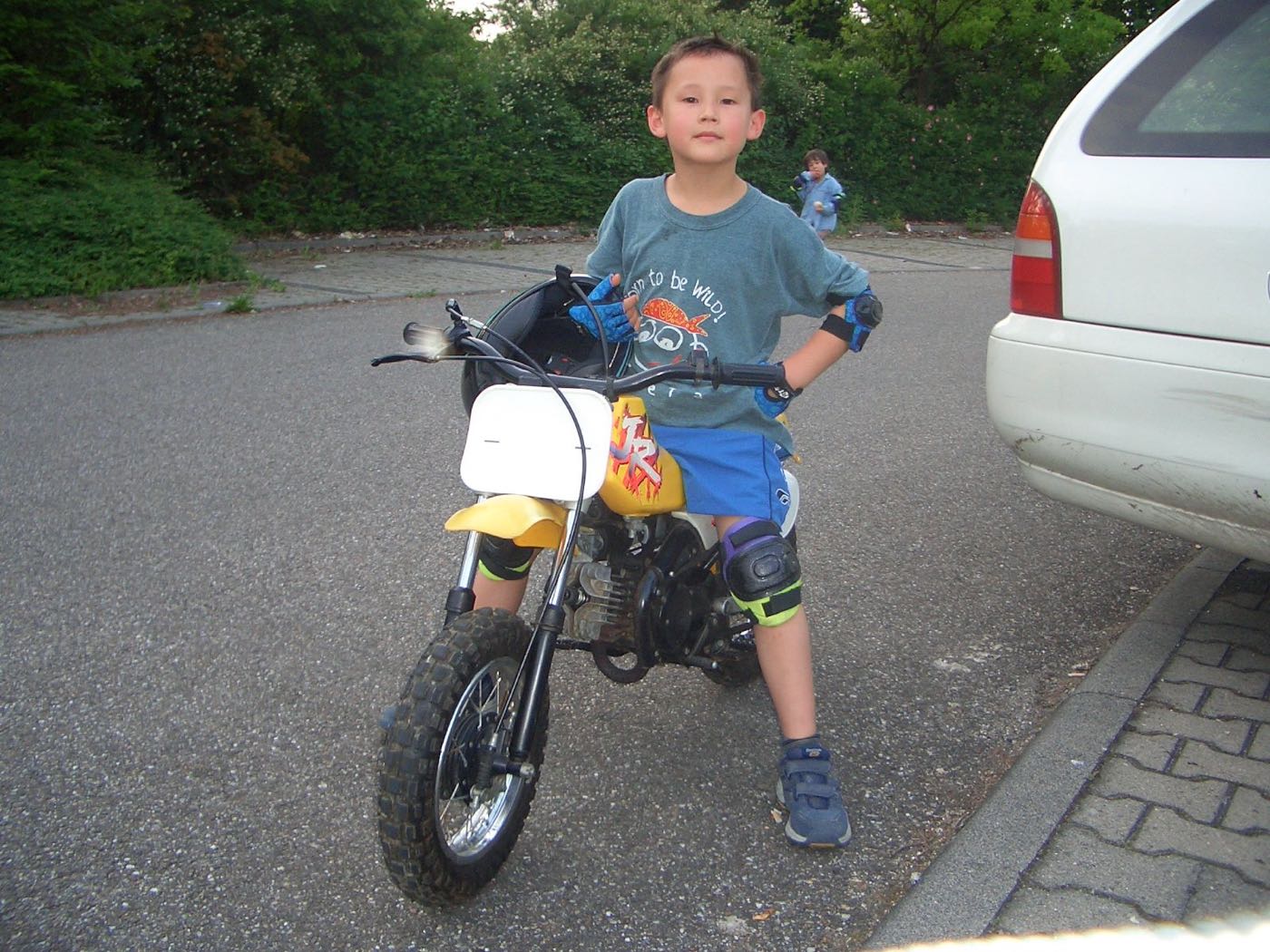 On a motorbike as a boy